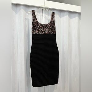 Great form fitting dress.